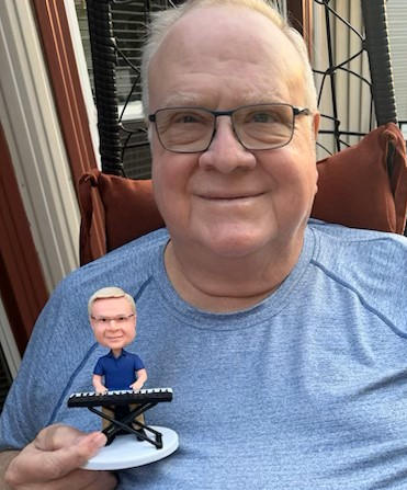 Craig Smith with the "Craig Smith Bobblehead"