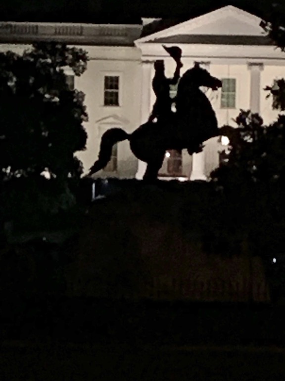 General Andrew Jackson and White House at night
